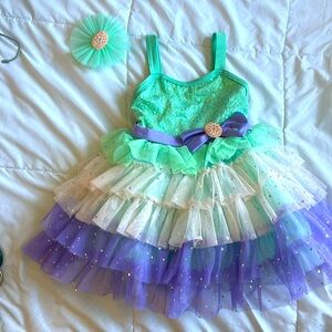 Weissman XSM purple green and white sequins dance costume. Worn once.